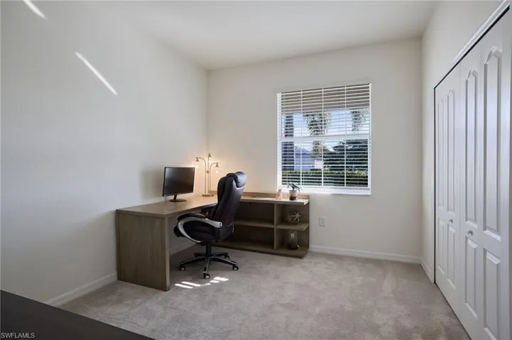 View of bedroom being used as office