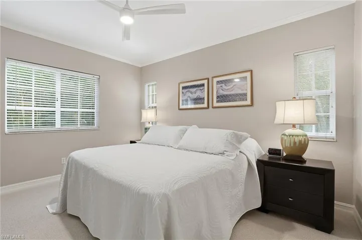 Primary bedroom has lots of natural light