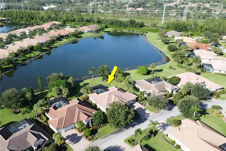 Aerial view of residential area with a large body of water
