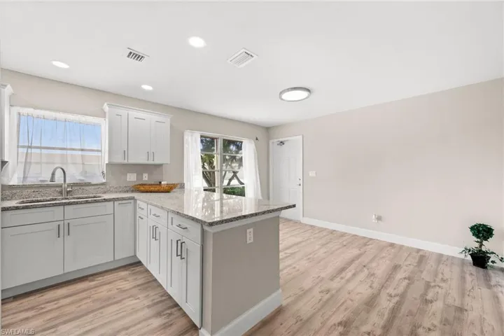 Kitchen and entry with breakfast nook