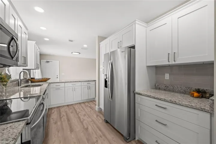 Well appointed kitchen with stainless appliances