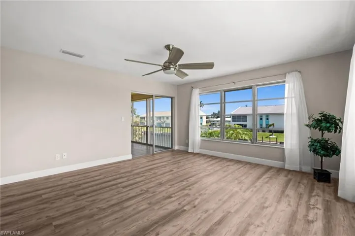 Living Room overlooks the canal and has access to the lanai