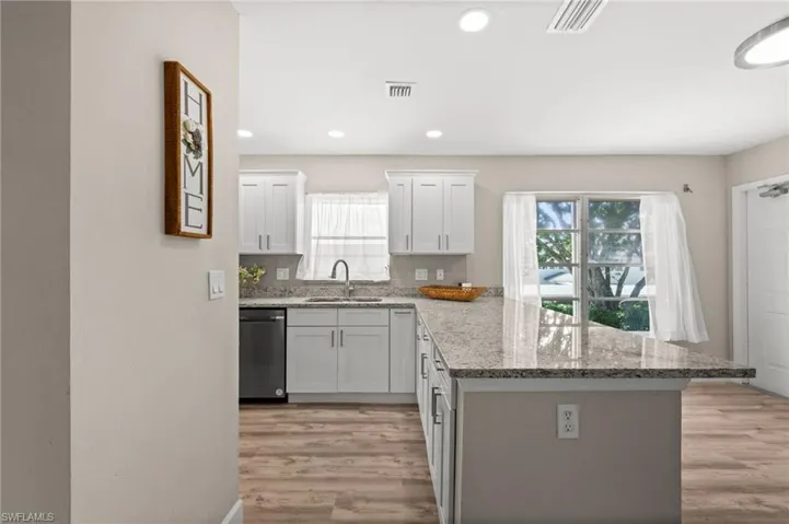 Looking from the kitchen to the front entry