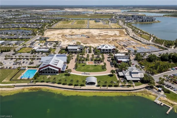 Aerial overview of property's location with a large body of water