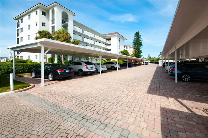 One covered parking space plus guest