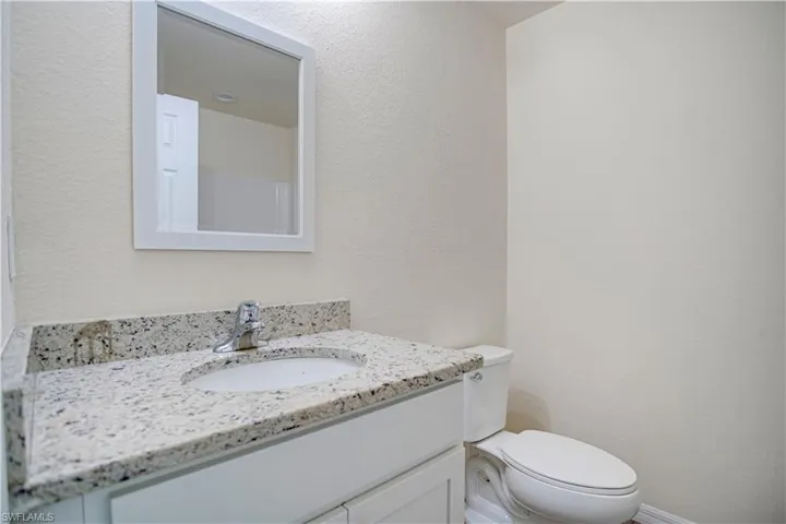 Bathroom with granite vanity top