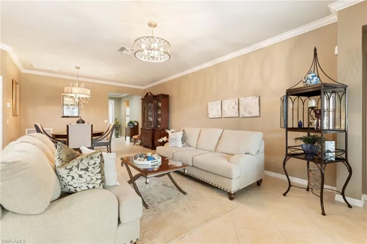 28582 Guinivere Way Bonita Springs FL  - Living area with crown moulding, and updated lighting fixture