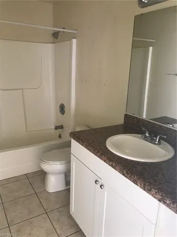 Bathroom features Tub/Shower combo and single vanity