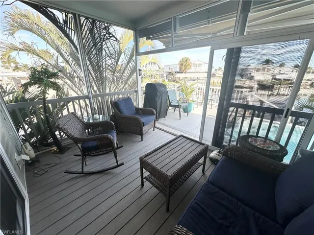 Rear porch with sliding screen door