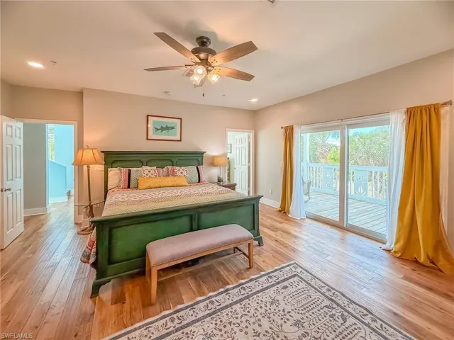 Bedroom featuring access to outside, recessed lighting, light wood-style floors, baseboards, and ceiling fan