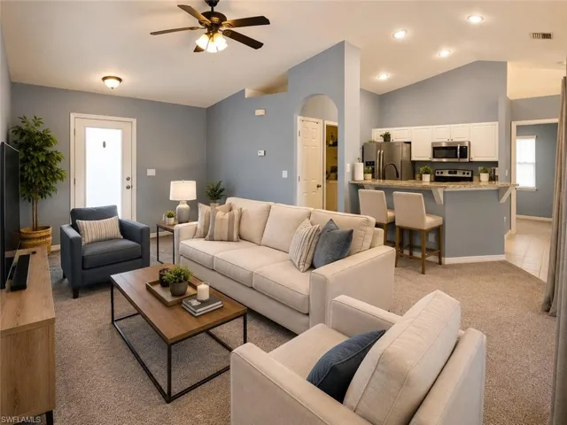 Open-concept great room flows seamlessly into the kitchen and dining area.