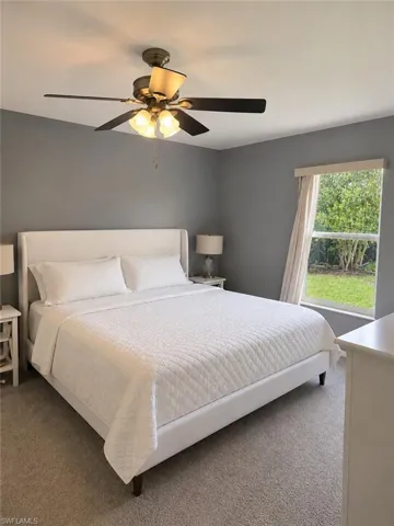 Primary bedroom with backyard views and a spacious layout.