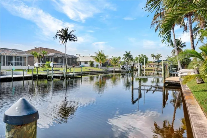 Property view of water featuring a boat dock