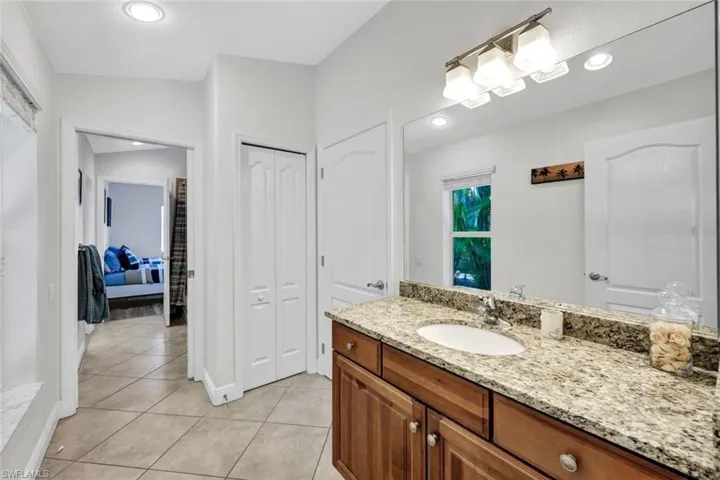 Bathroom with tile floors and vanity