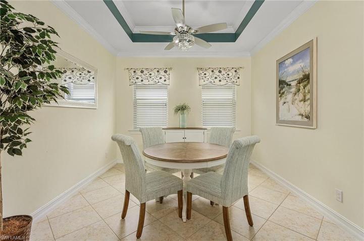 Separate dining room with trey ceilings