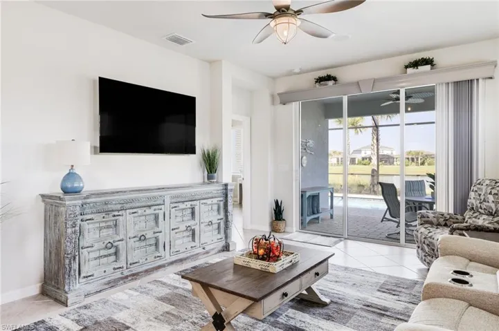 Great room w/view of the pool. Surround sound & designer lighting.