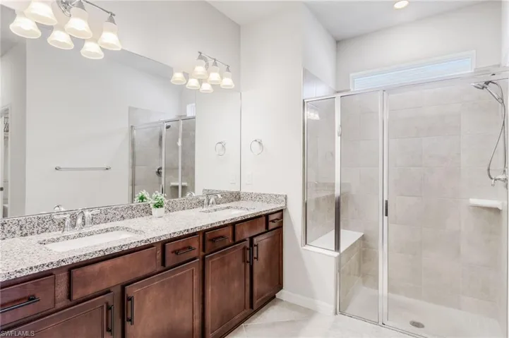 Dbl. Sink granite vanity and walk-in shower. Sep. water closet.