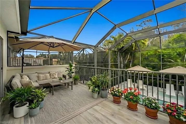 Sunroom featuring outdoor seating