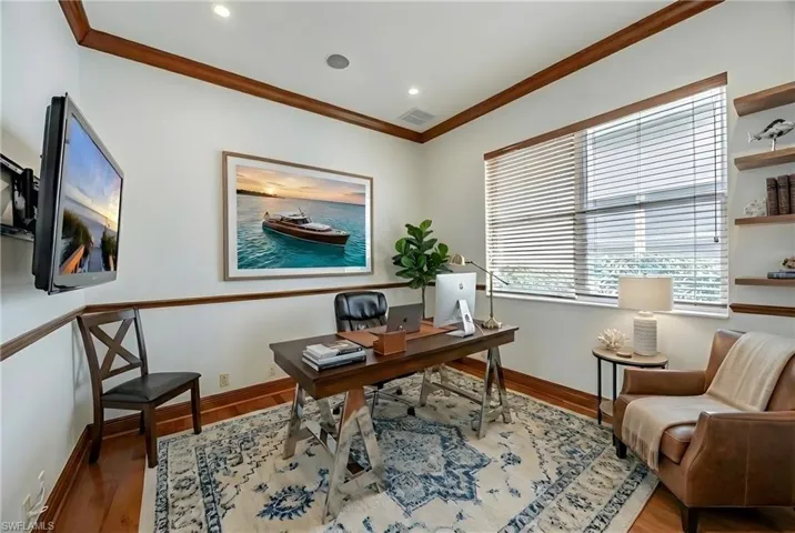 Office featuring ornamental molding, wood finished floors, and recessed lighting