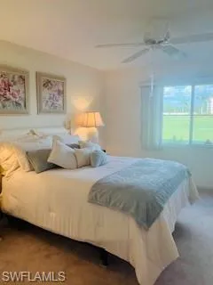 Bedroom featuring carpet floors and ceiling fan