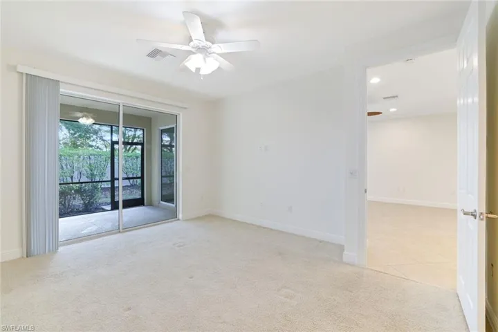 Unfurnished room with light carpet, a ceiling fan, and recessed lighting