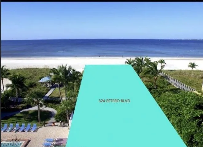 View of property's community with a water view and a view of the beach