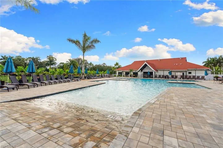 Community pool with a patio area