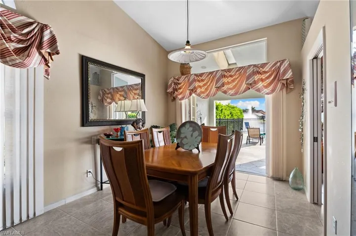 Dining area with plenty of natural light and tile floors
