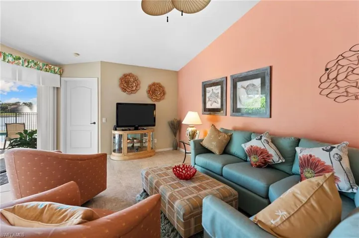 Family room  featuring lofted ceiling