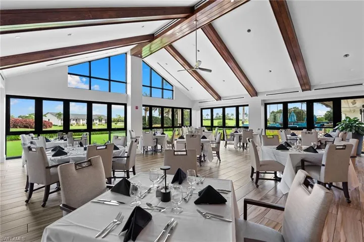 Community lobby featuring high vaulted ceiling and beamed ceiling