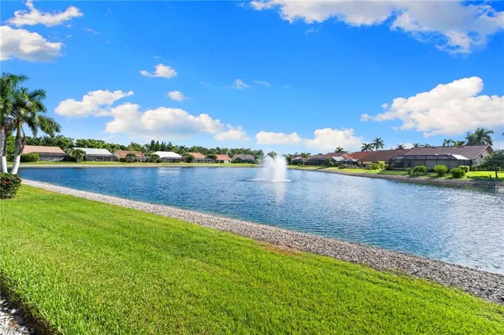 Water view featuring nearby suburban area