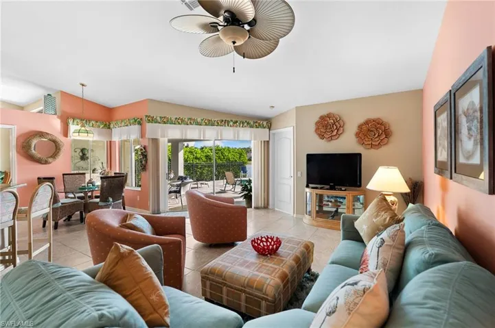 Family room with tile floor and view of lake & fountain