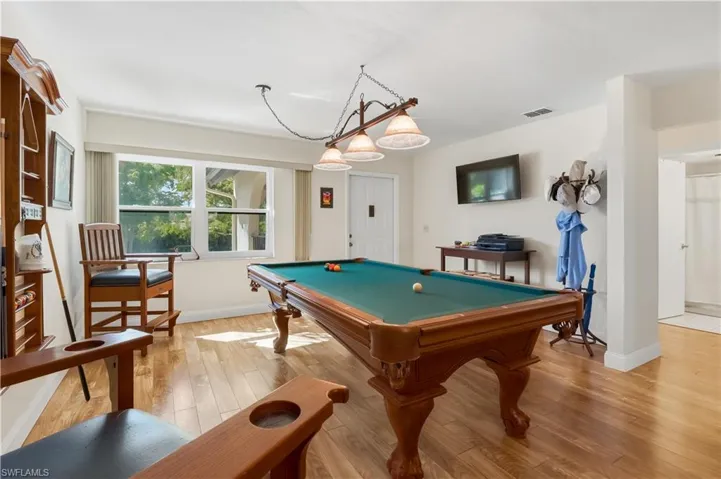 Rec room featuring billiards table and light wood finished floors