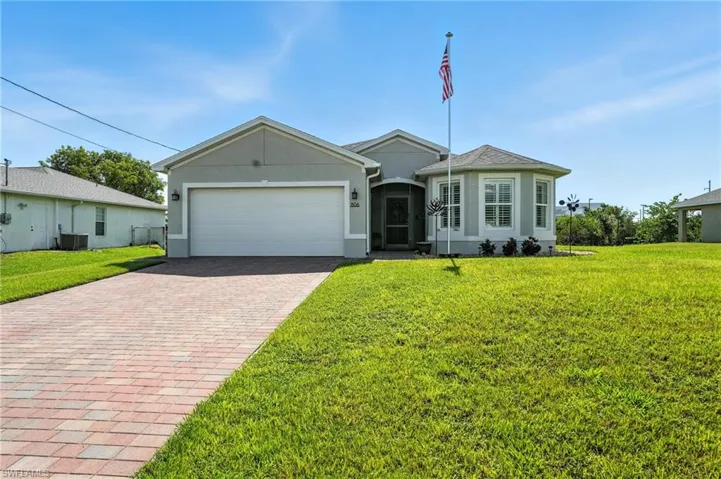 806  Champion  AVE, Lehigh Acres, FL 33971