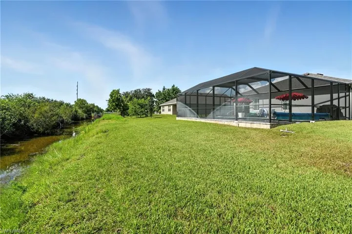 806  Champion  AVE, Lehigh Acres, FL 33971