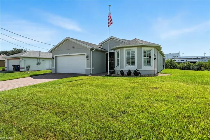 806  Champion  AVE, Lehigh Acres, FL 33971