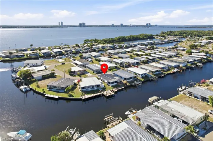 Aerial view of residential area with a nearby body of water