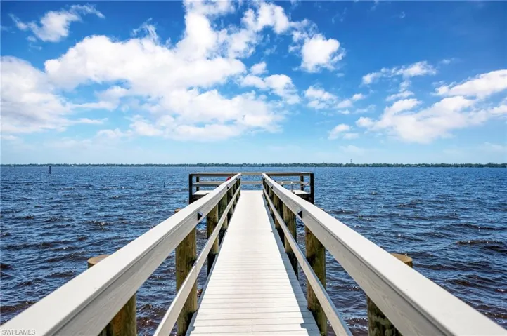 Dock featuring a water view