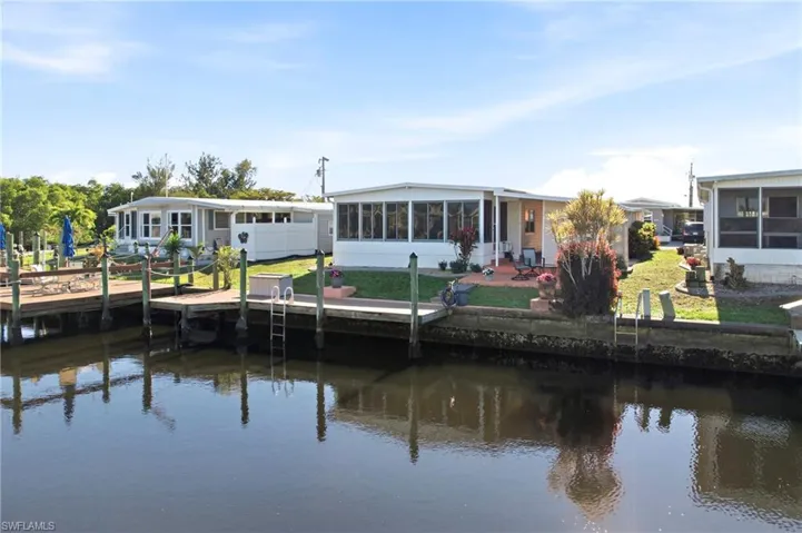 Dock featuring a water view