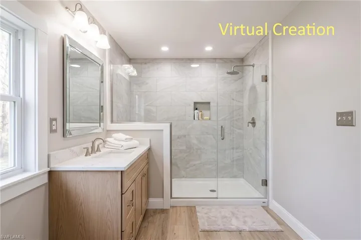 Virtually staged alternate primary bathroom. to show what it could look like