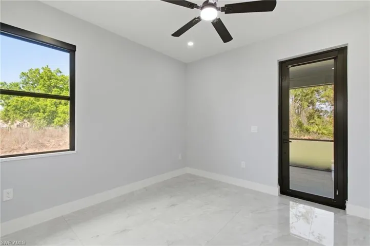 Unfurnished room featuring ceiling fan and recessed lighting