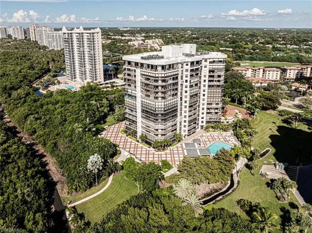 Walk from your 2nd floor unit to the pool, fitness room and walkway to the beach.