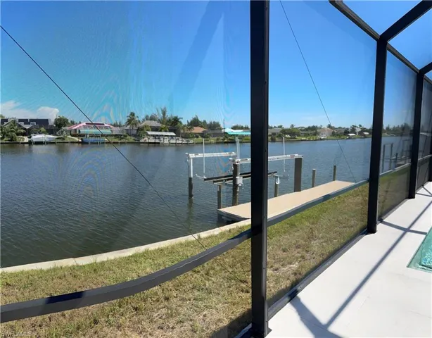 Screened enclosure with direct water access