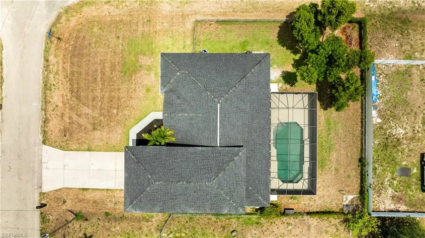 Large Corner lot with fence and irrogation system