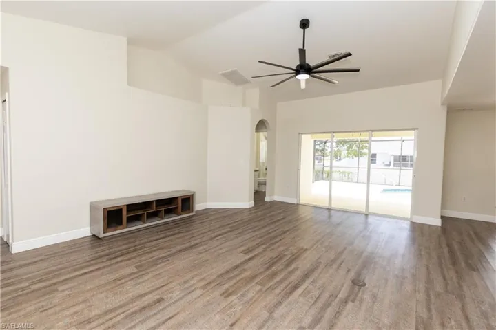 Triple slider overlooking the pool from the Main Living Area fomr Family/Living Room