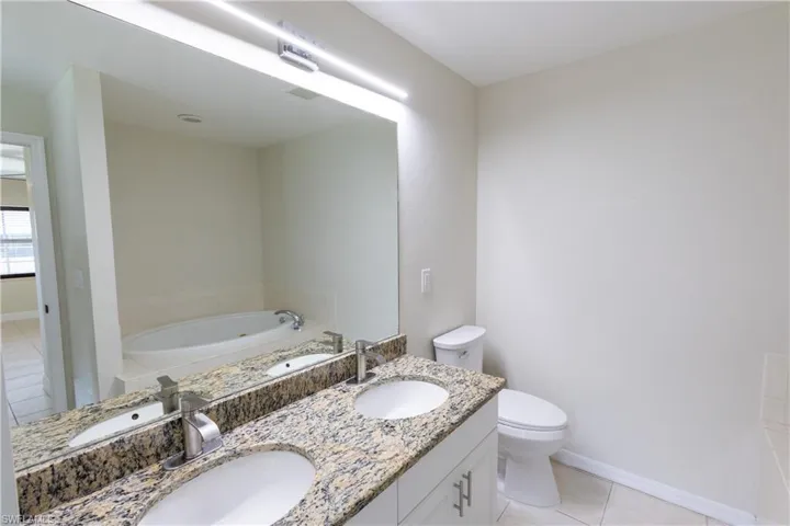 First floor primary Bedroom full bath vanity