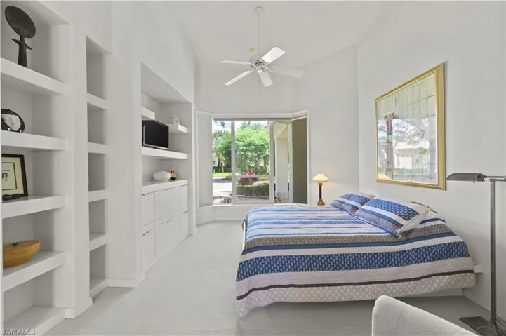 A cozy guest retreat complete with custom built-ins.