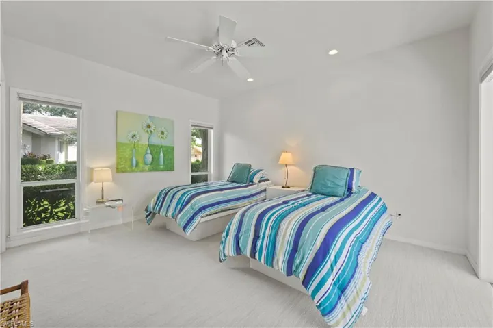 Beautiful views and natural light make this guest suite feel especially welcoming.