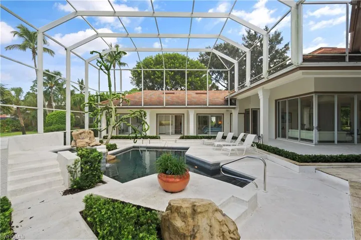 Step outside to your own private oasis in the heart of Bonita Bay!