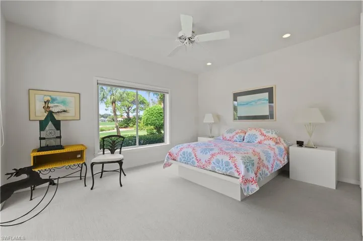 A cheerful guest suite privately located away from the primary bedroom.